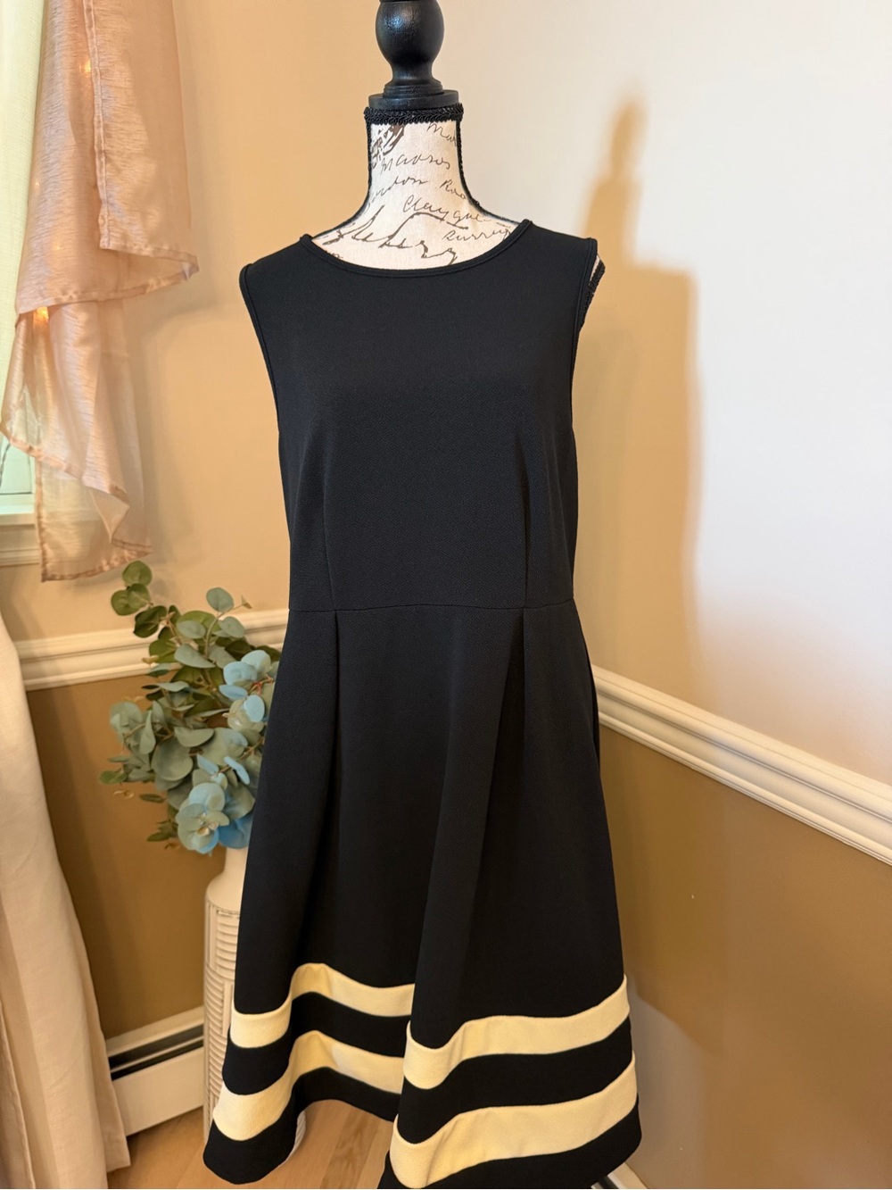 Elegant Black Midi Dress with Ivory Hem Stripes